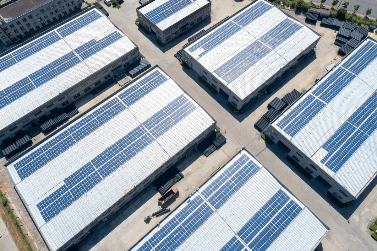 aerial view of solar on warehouse roofs