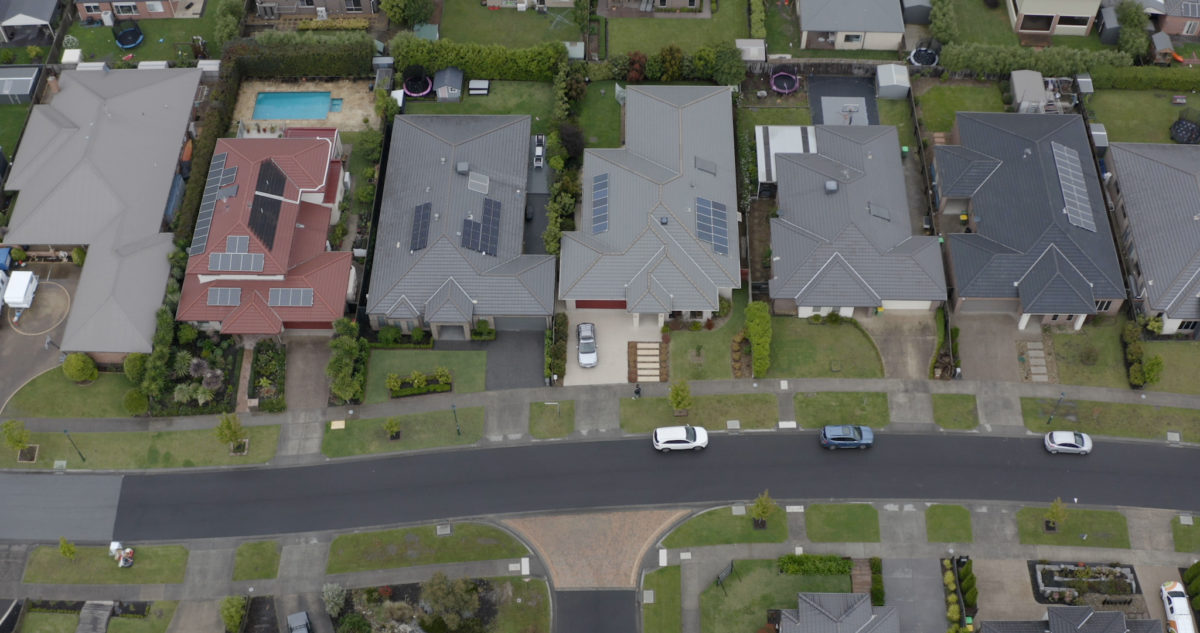 Arial shot of solar panels installed on roofs